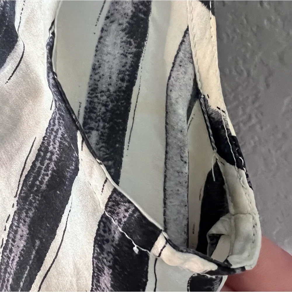 100% silk black|white collared, button-up blouse, size sm-med. short sle…